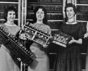 women_holding_parts_of_the_fir.jpg